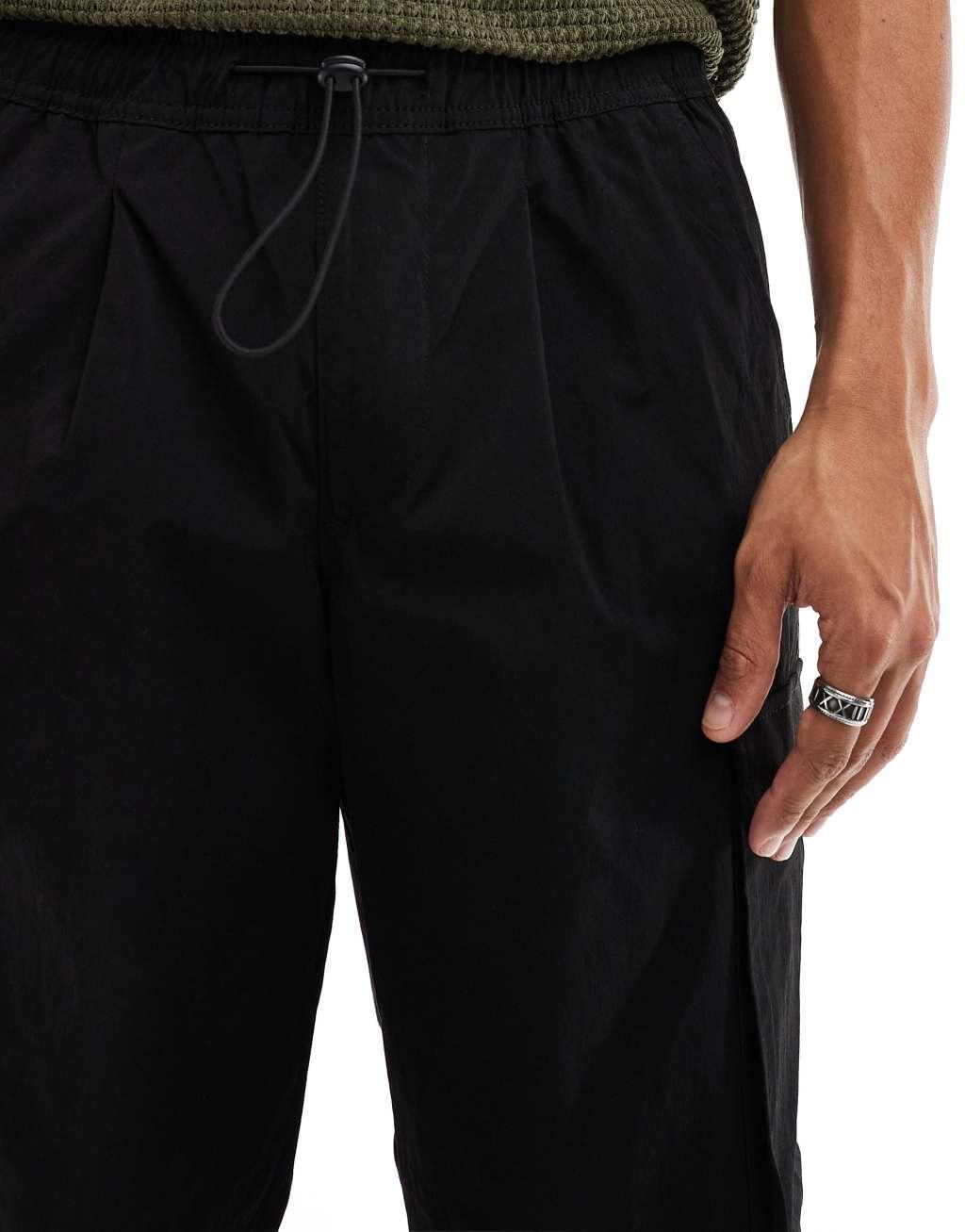 Jack & Jones bill drawstring wide fit tech cargo pants in black Product Image