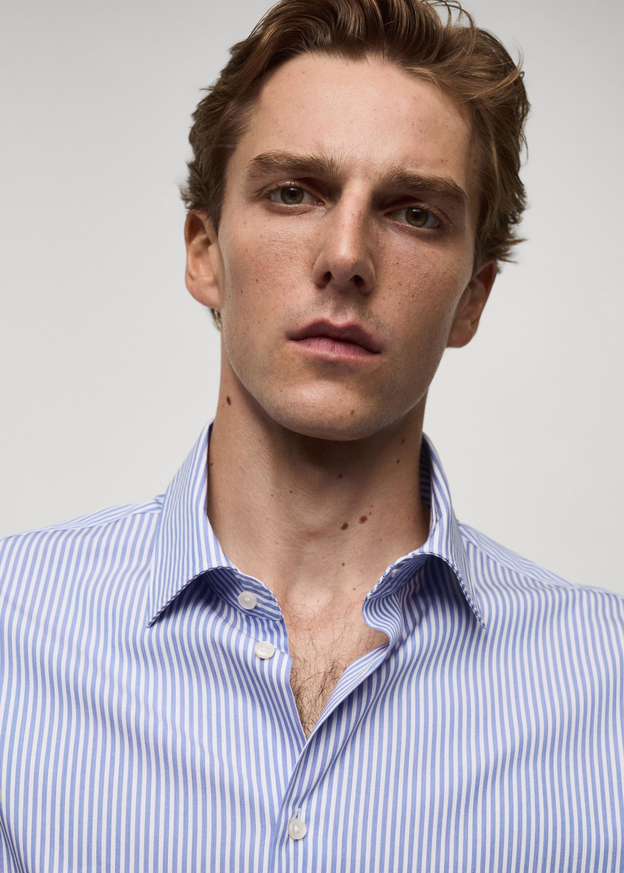 Slim fit fine-striped cotton shirt - Men | MANGO USA Product Image