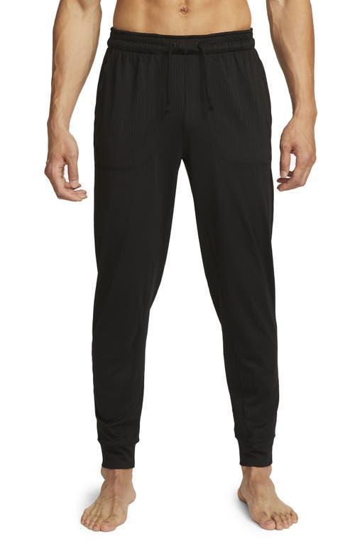 NIKE Yoga Dri-fit Jersey Joggers In Black/black Product Image