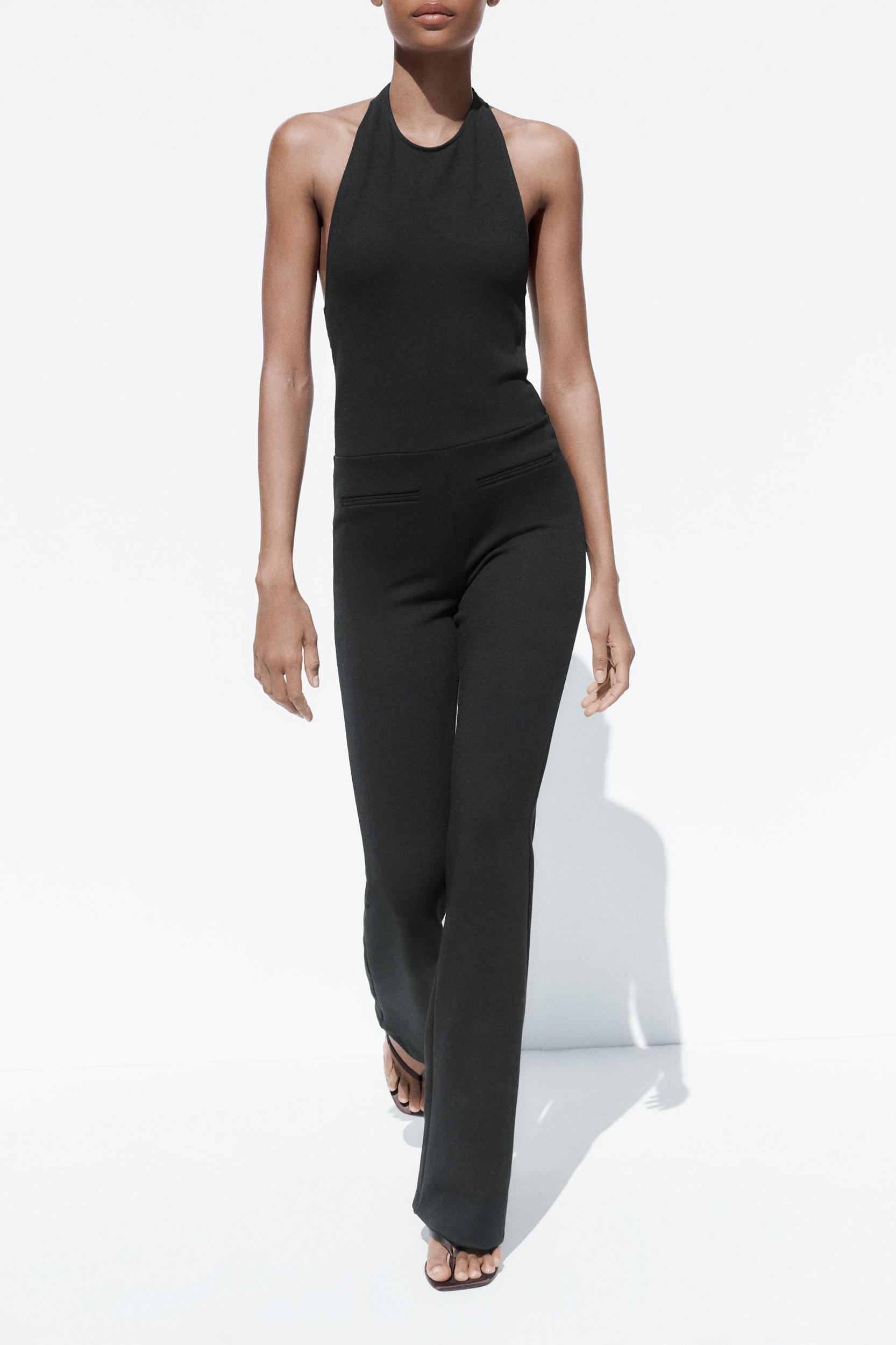 HALTER FLARE STRETCH JUMPSUIT Product Image